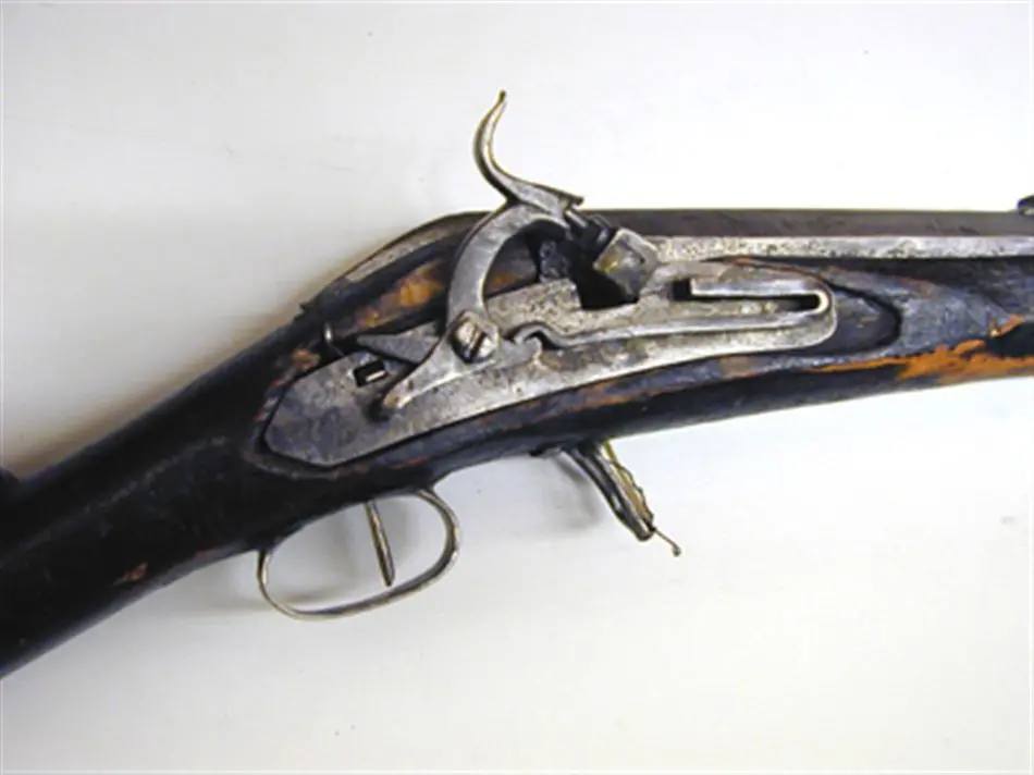 Slagsnapplåslodbössa, utfjäderslås, tåspänn,  Norrbotten, 1866