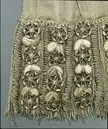 Skärp består av två delar av beige-grön silkestrikå använt av Gustav III vid attentatet på Operan den 16 mars 1792 .