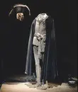 Skärp består av två delar av beige-grön silkestrikå använt av Gustav III vid attentatet på Operan den 16 mars 1792 .
