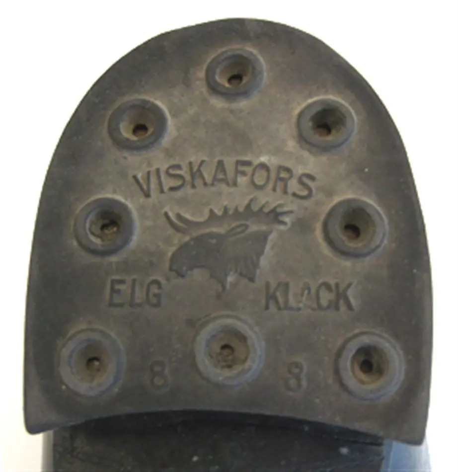 Sko av svart läder