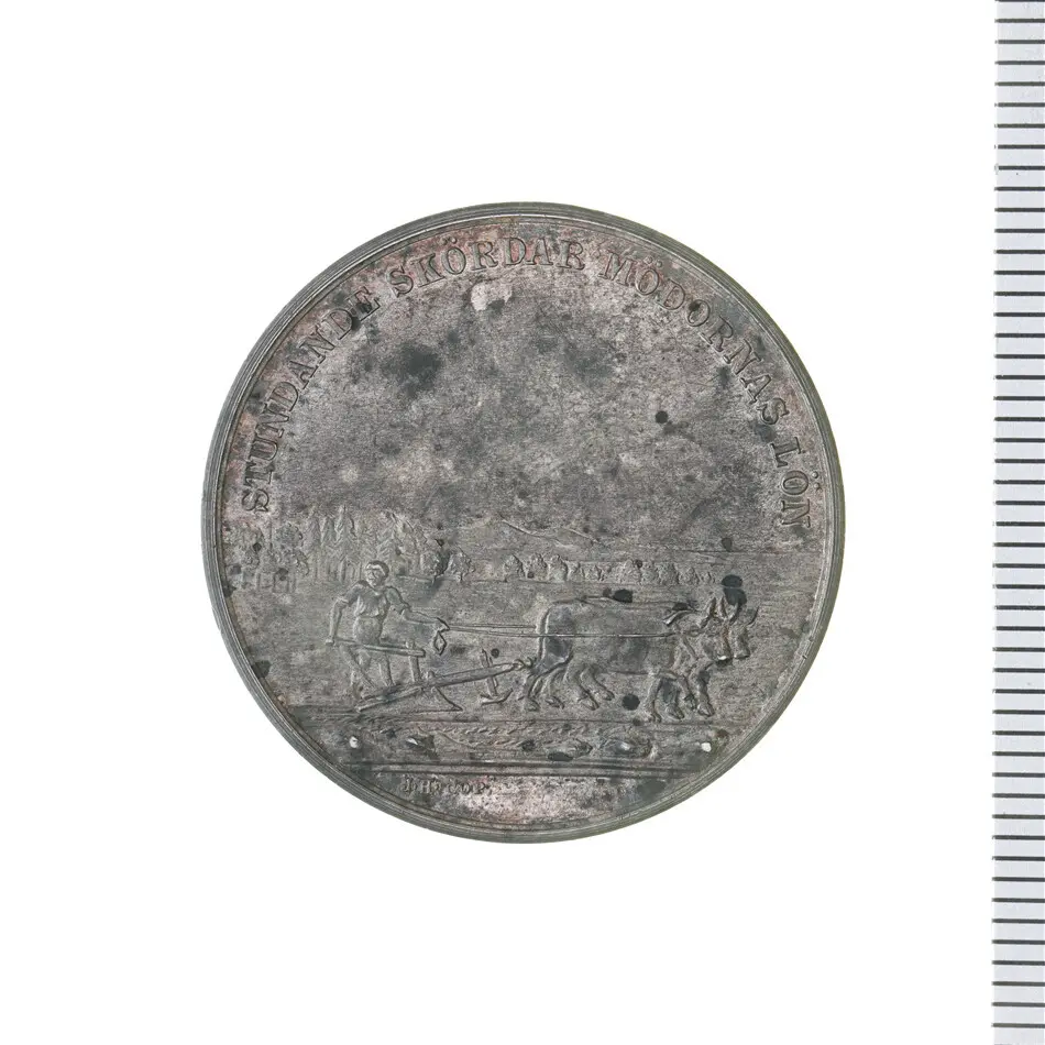 Medalj